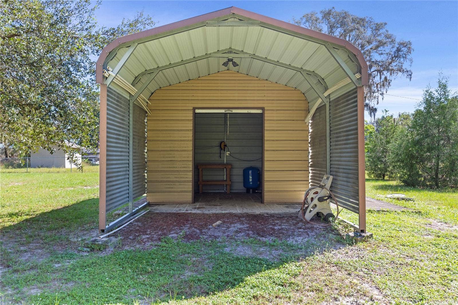 Shed/well on adjacent lot