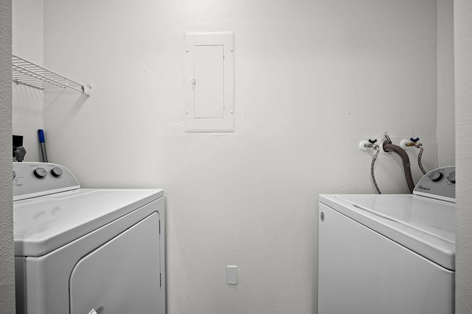 in door laundry area in the kitchen