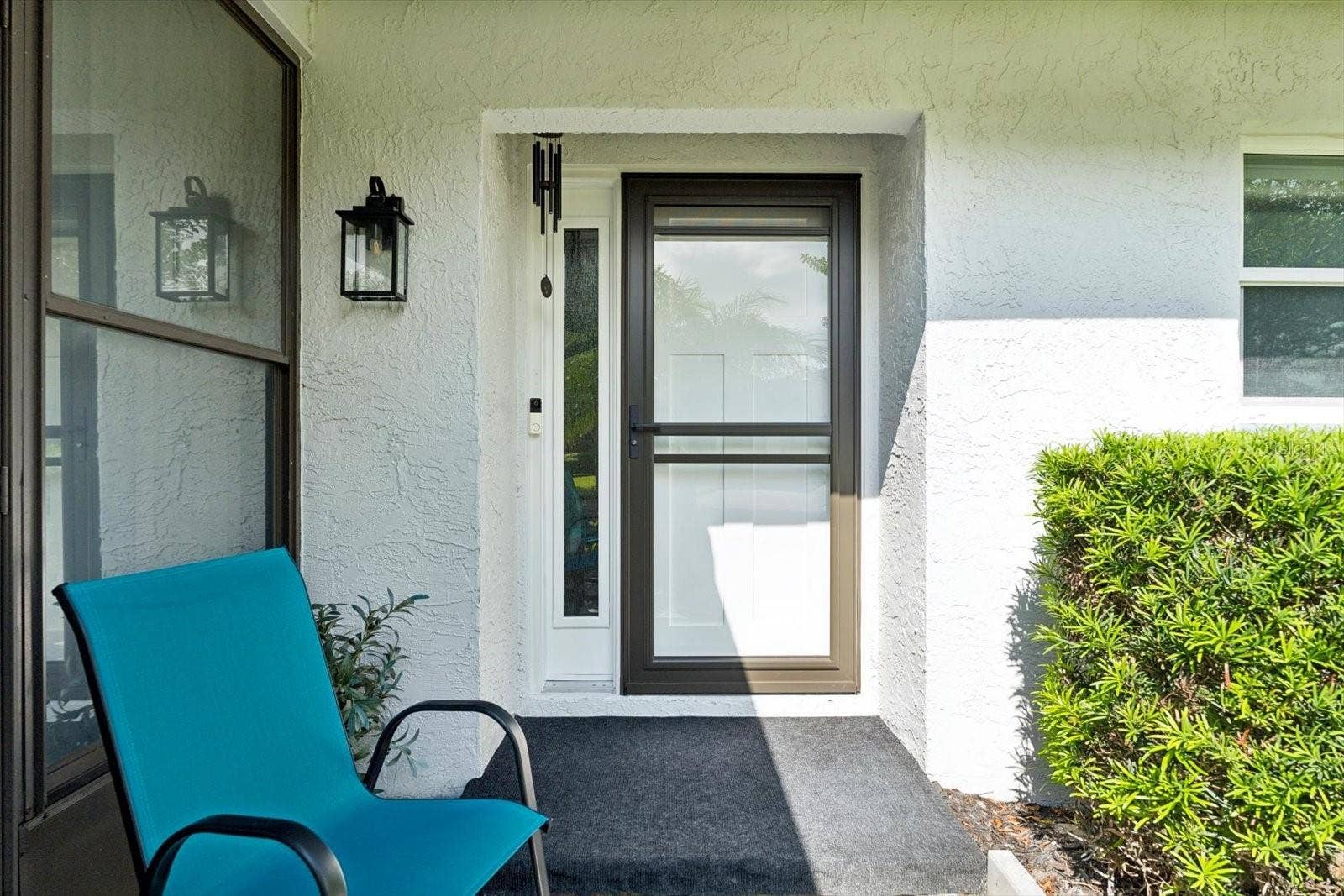Front entrance with 2026 hurricane rated front door.