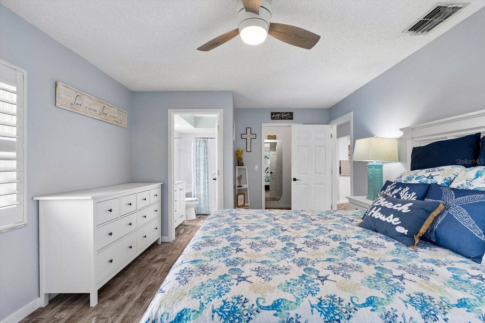 Primary bedroom with walk in closet and en suite.