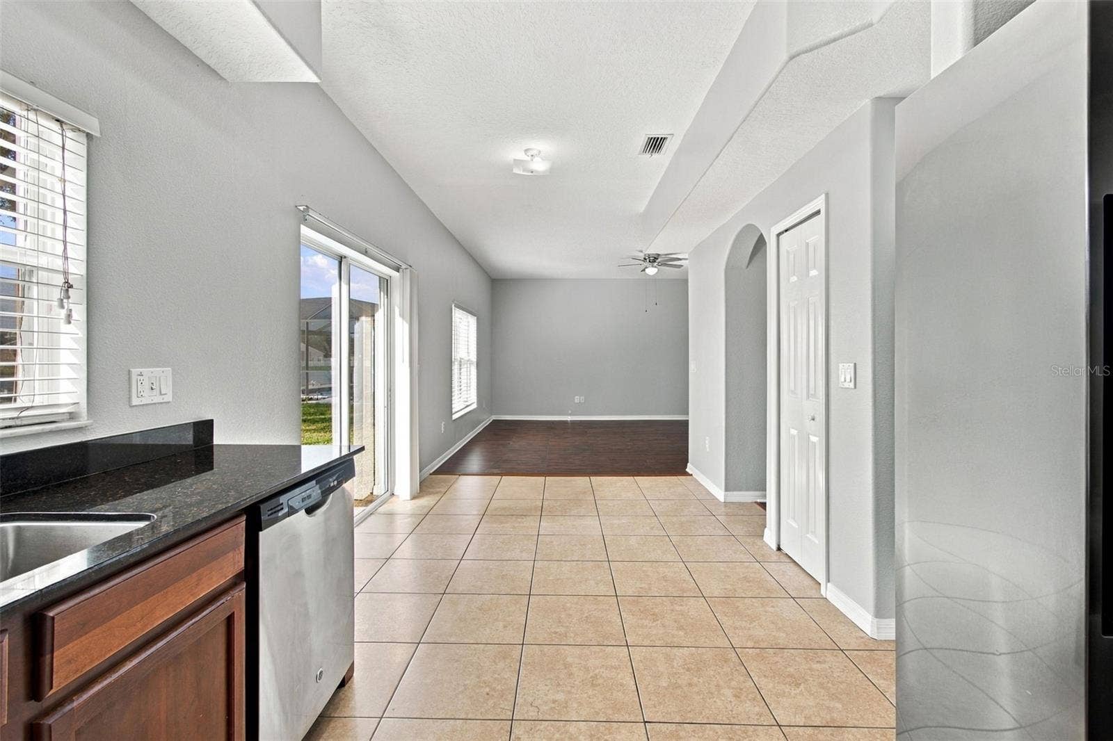 525 POWDER VIEW DRIVE, Ruskin, FL 33570 Easy Access from kitchen to Dinette, Family Room, Guest Bathroom, to Dining Room/Living room