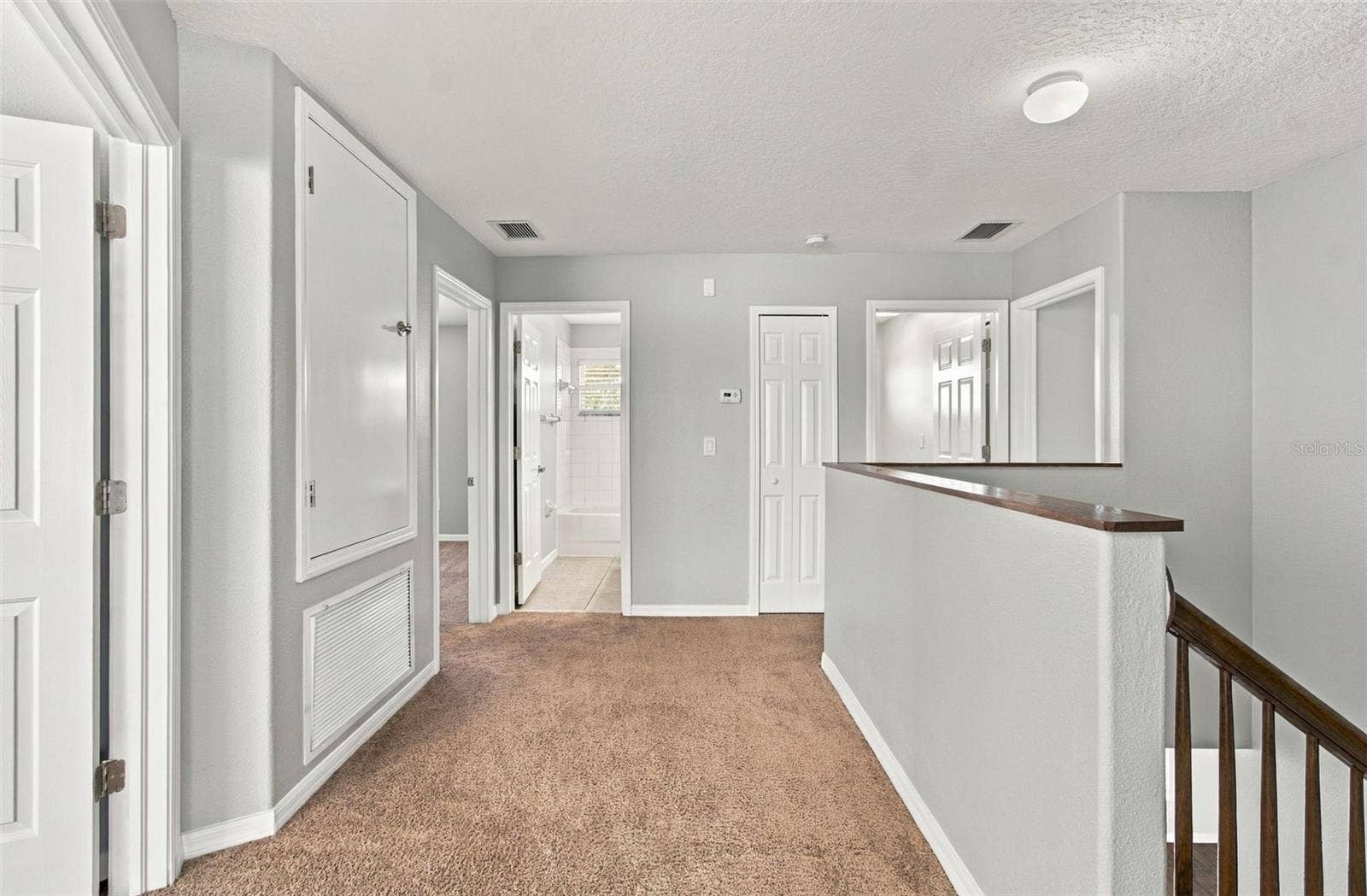 525 POWDER VIEW DRIVE, Ruskin, FL 33570 Upstairs Hallway to other bedrooms, Laundry Room. A/C C.oset
