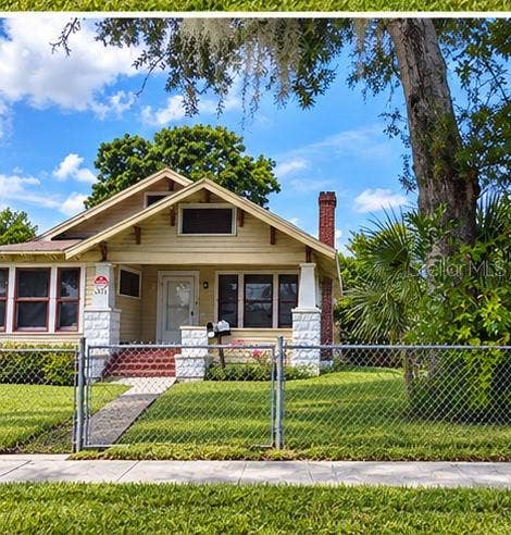 1511 19TH AVE AVENUE S, St Petersburg, FL 33705 Front of property -virtually landscaped