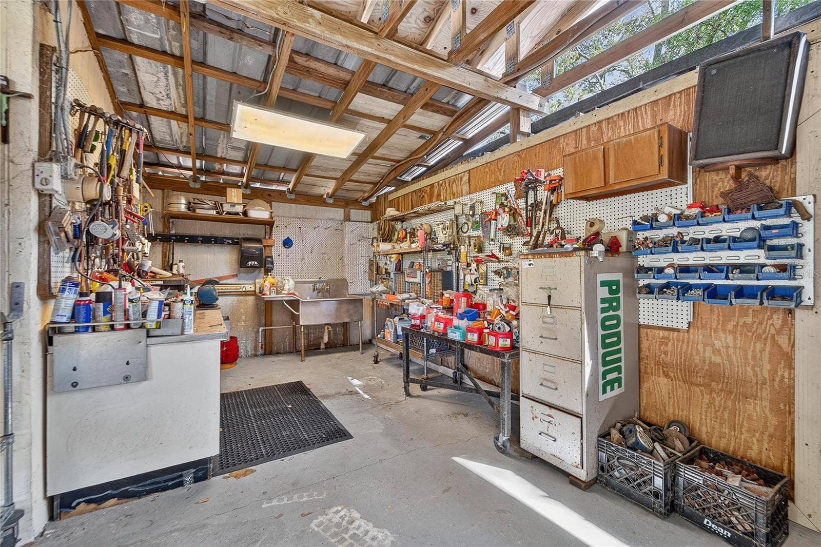 28329 LINDENHURST DRIVE, Wesley Chapel, FL 33544 Shop/Barn has a sink and cement floor