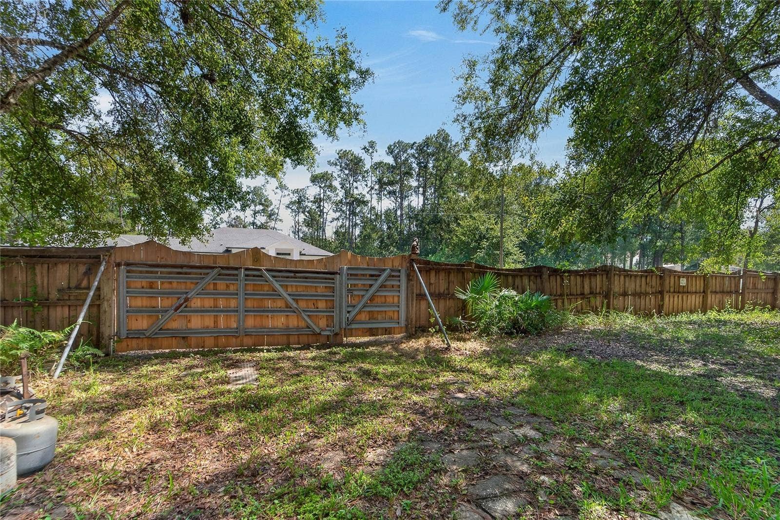 0 OLCOTT DRIVE, Wesley Chapel, FL 33544 Wooden Fence with gate on Olcott Drive