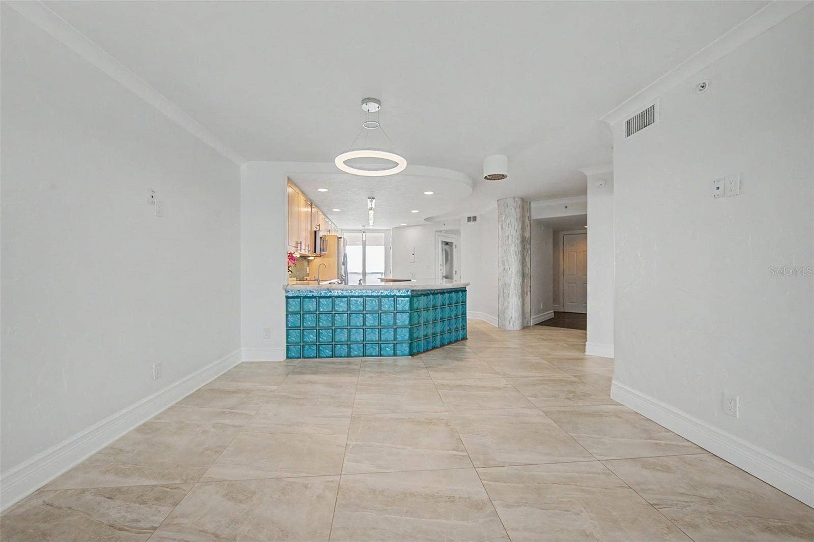 Living area looking back into the Dining and Kitchen areas