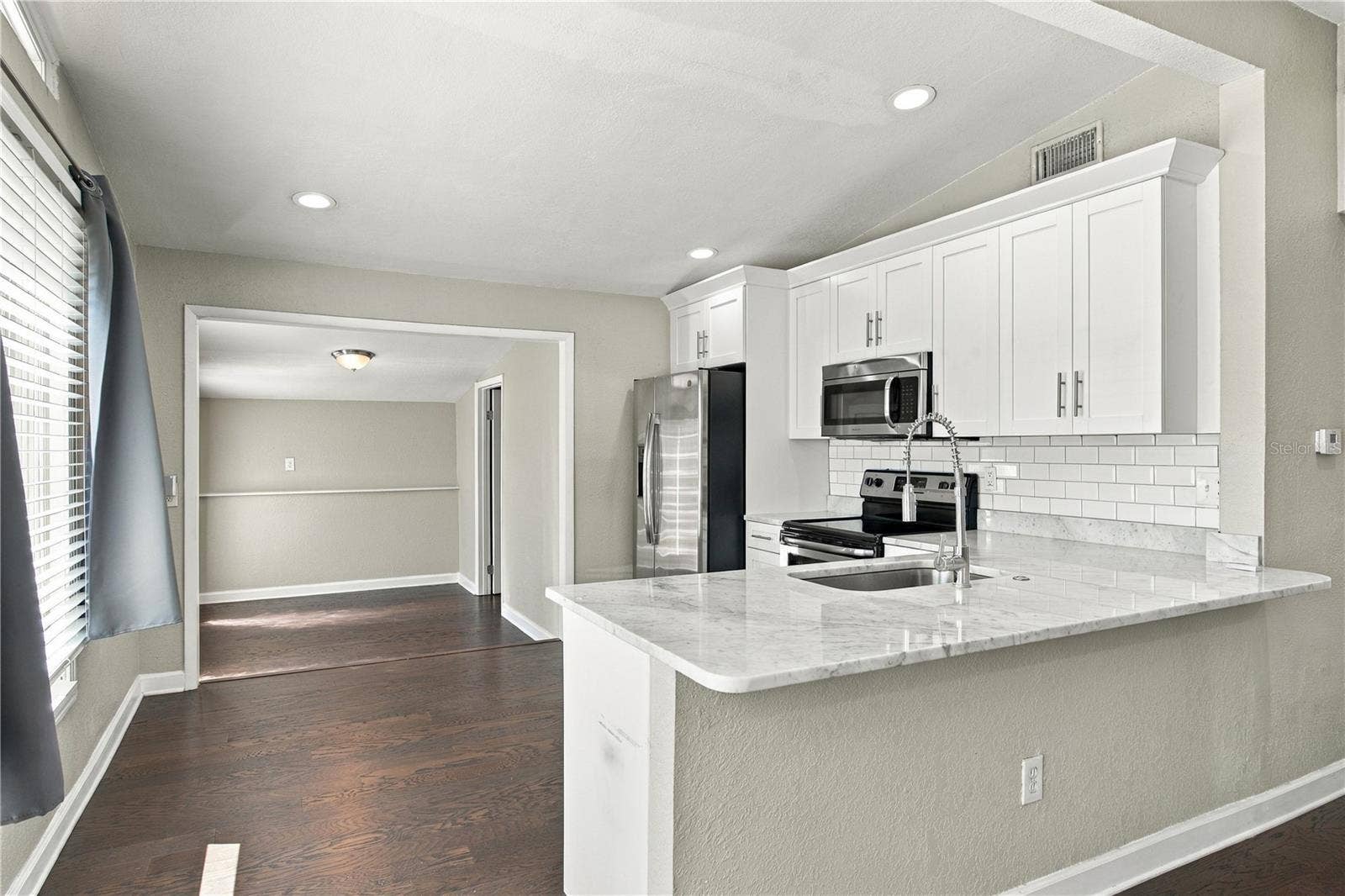 Open concept with breakfast bar