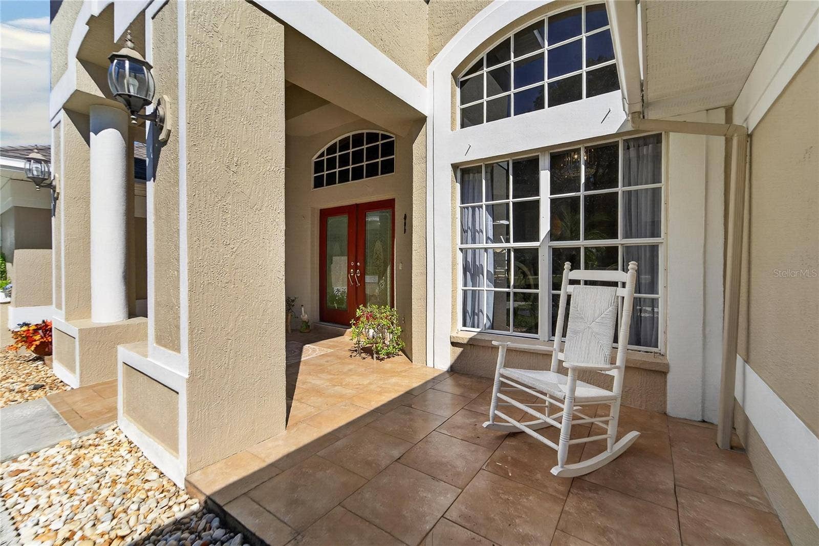 0 LINDENHURST DRIVE, Wesley Chapel, FL 33544 Front covered porch welcomes all.
