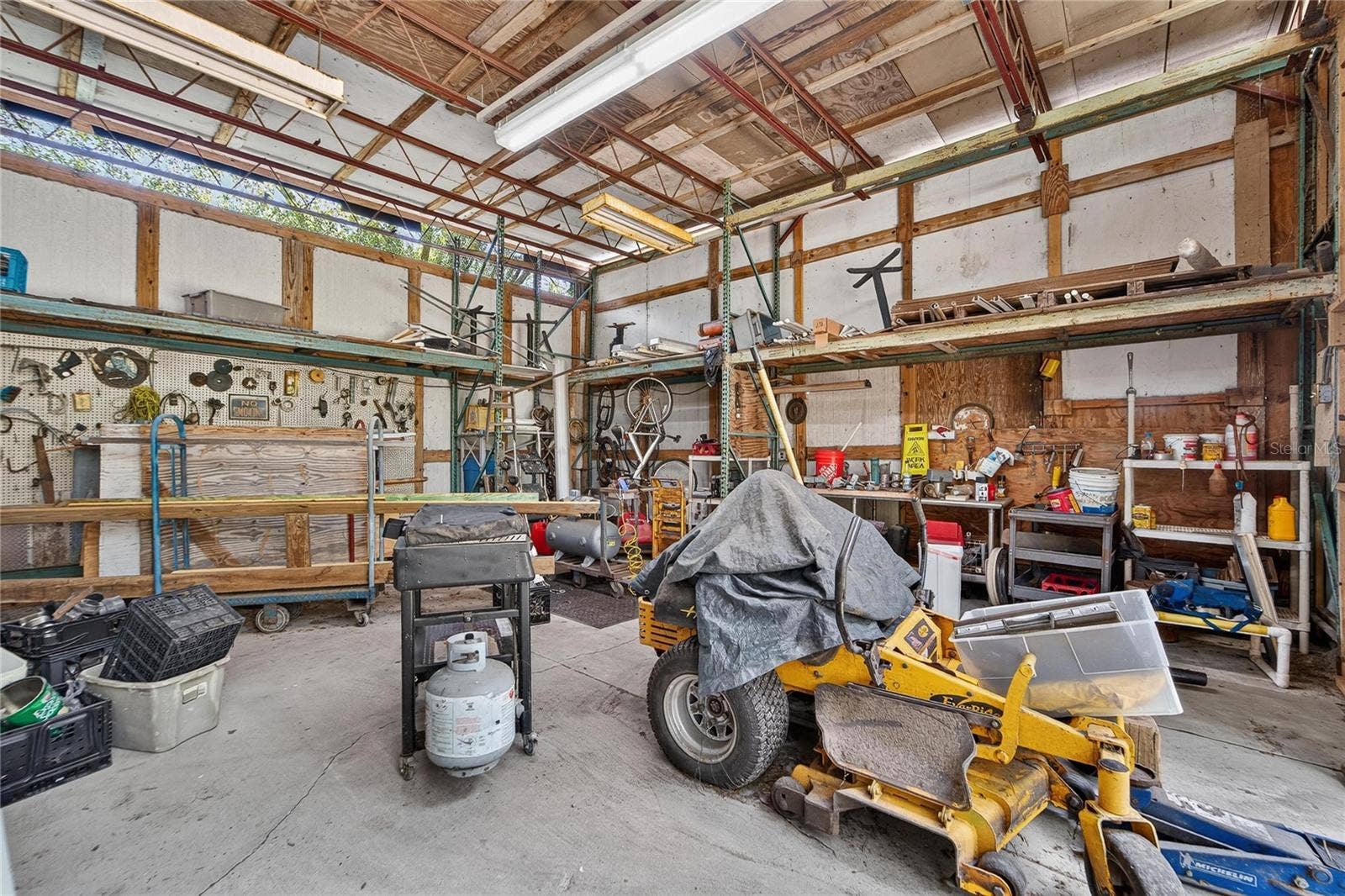 0 LINDENHURST DRIVE, Wesley Chapel, FL 33544 Rear Shed/shop/barn is 25 x 25 with 12' ceiling.