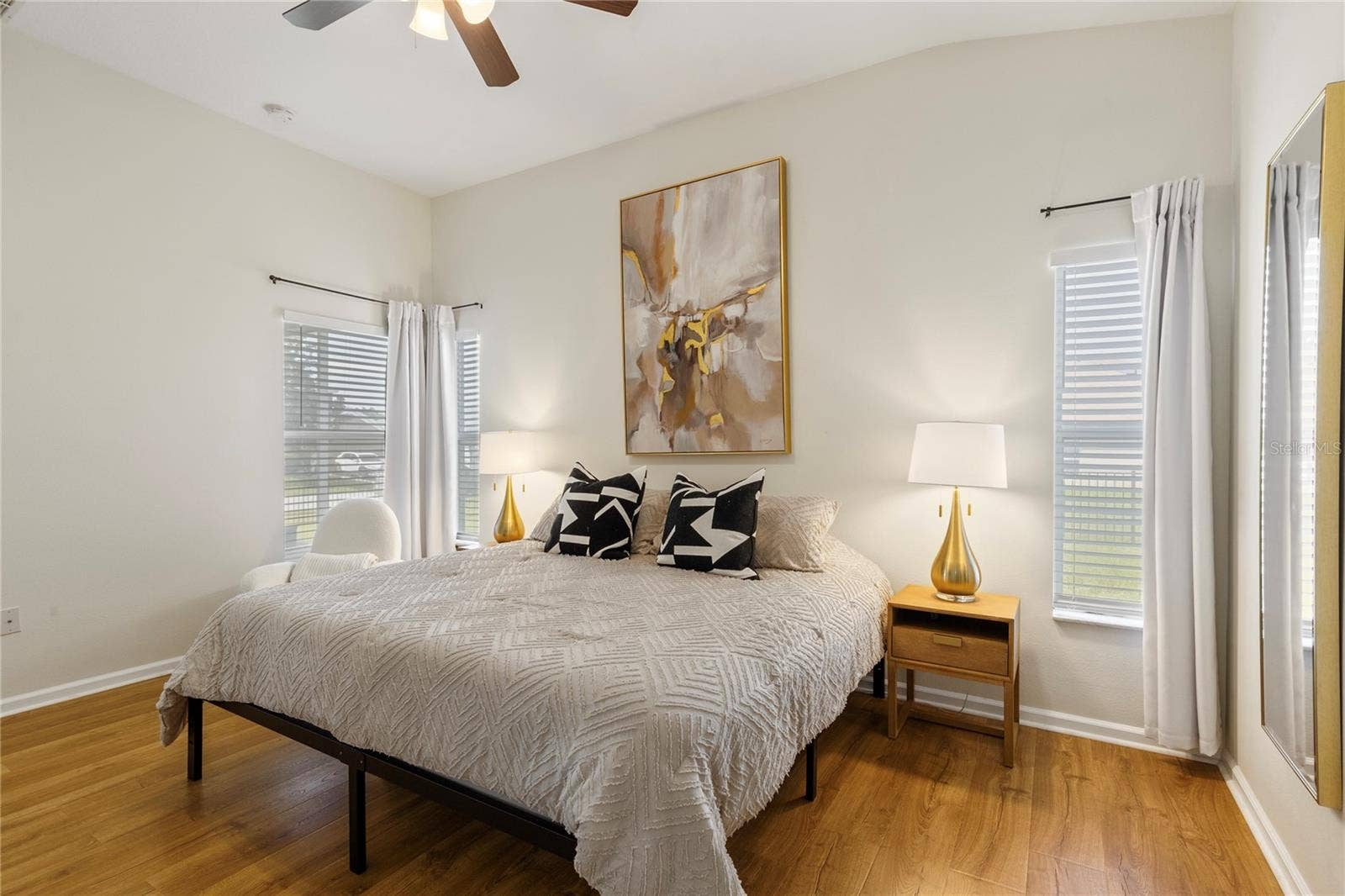 Primary room fits King bed, nightstands, dresser, chair, and more!