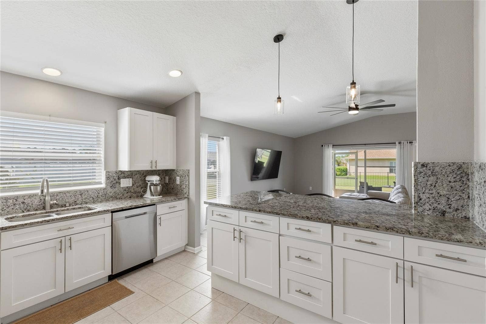 Open and updated kitchen with huge island penisular