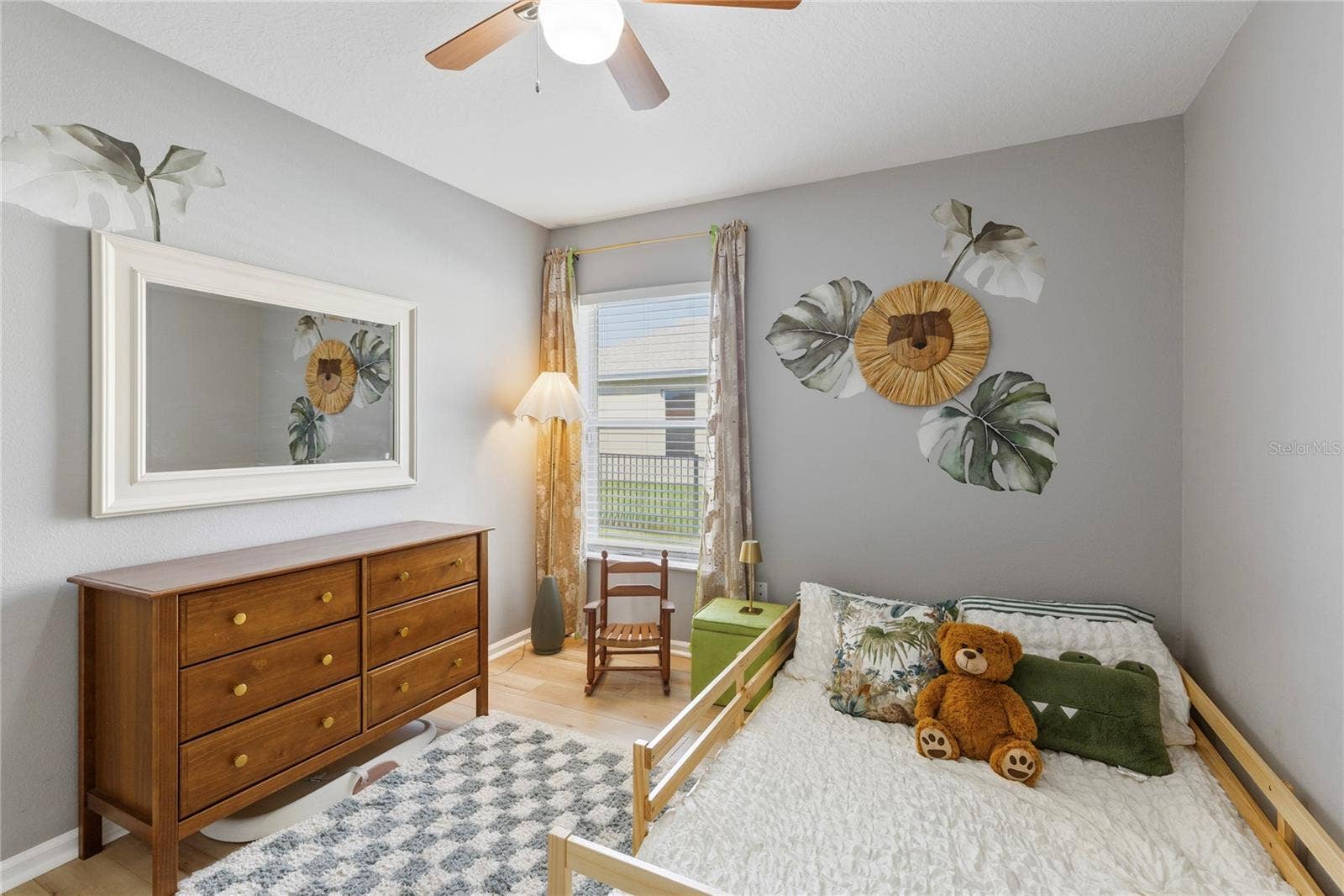 Bedroom with ceiling fan and large closet