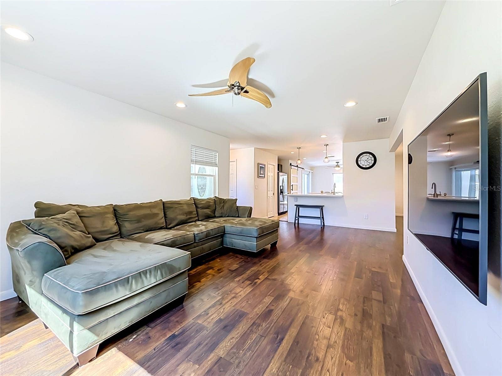 1852 SOURWOOD BOULEVARD, Dunedin, FL 34698 Living Room - Kitchen