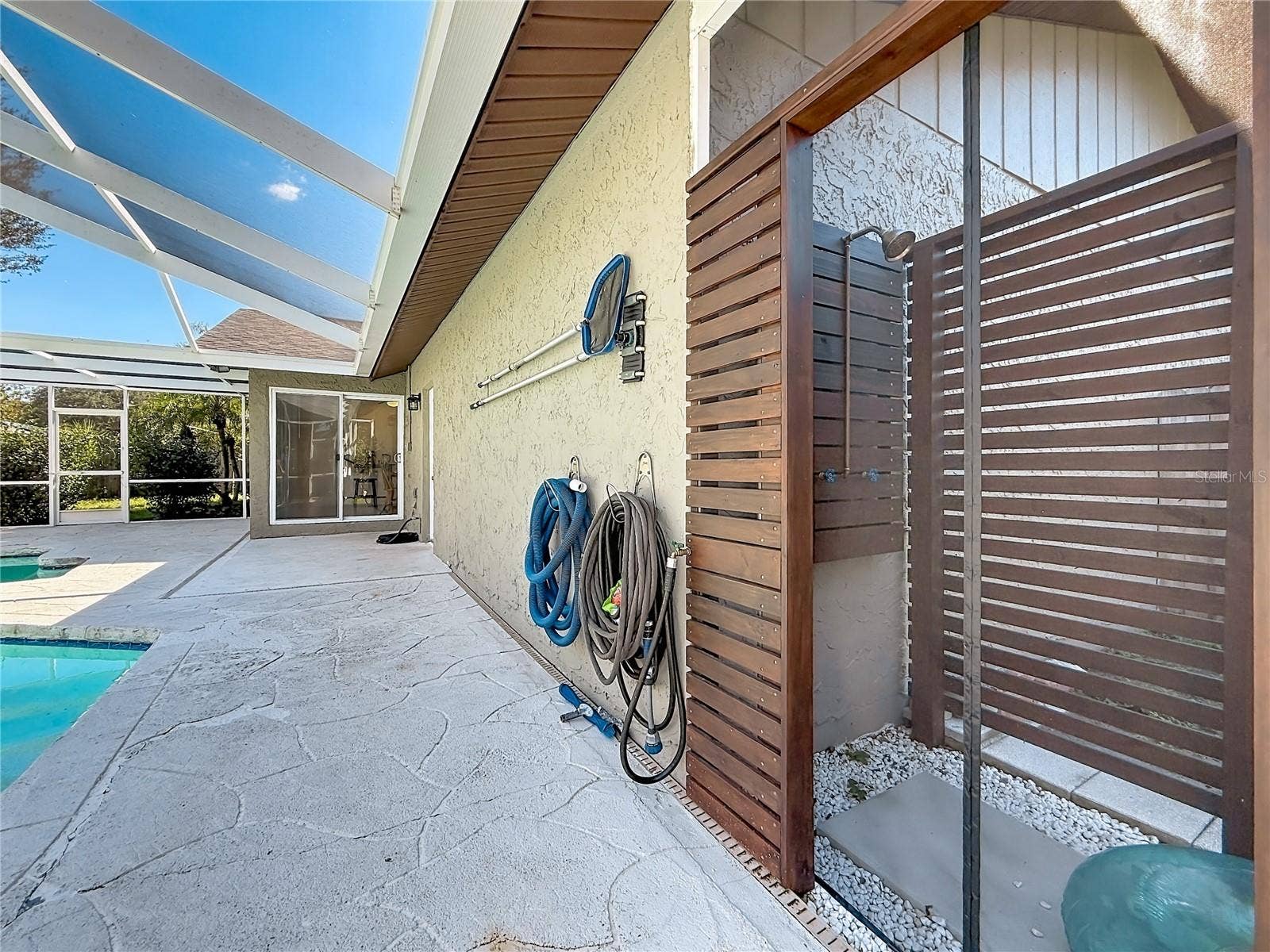 1852 SOURWOOD BOULEVARD, Dunedin, FL 34698 Pool Area Rinse Station