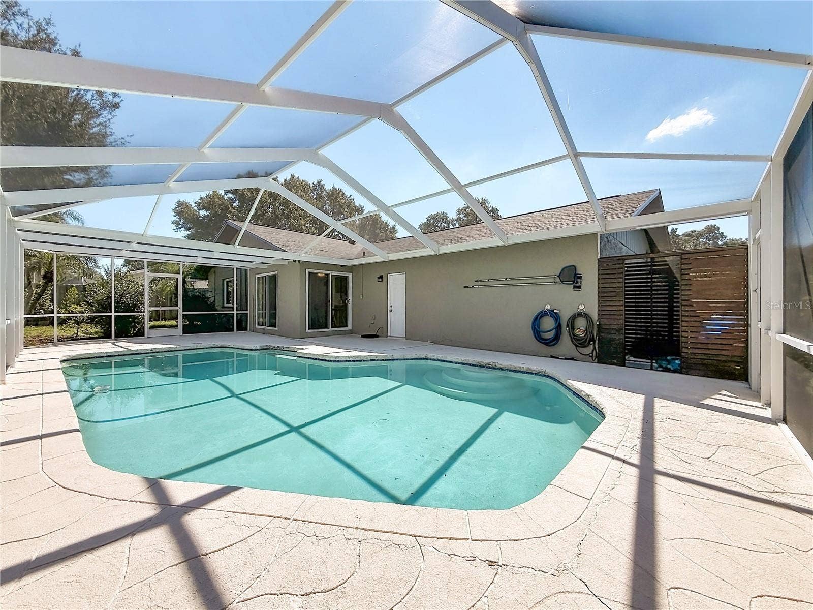1852 SOURWOOD BOULEVARD, Dunedin, FL 34698 Outdoor Living Space and Pool Area