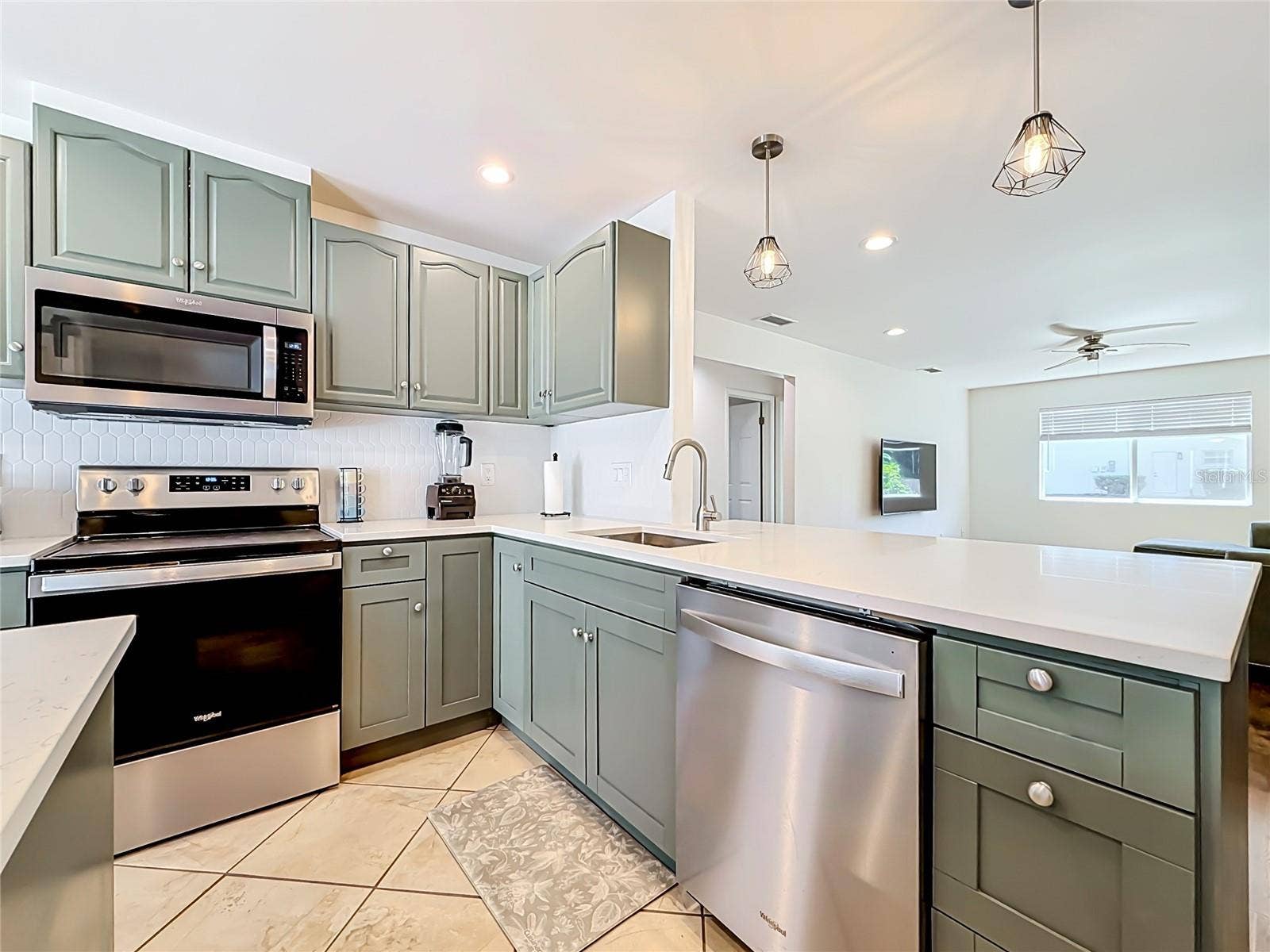 1852 SOURWOOD BOULEVARD, Dunedin, FL 34698 Kitchen - Living Room