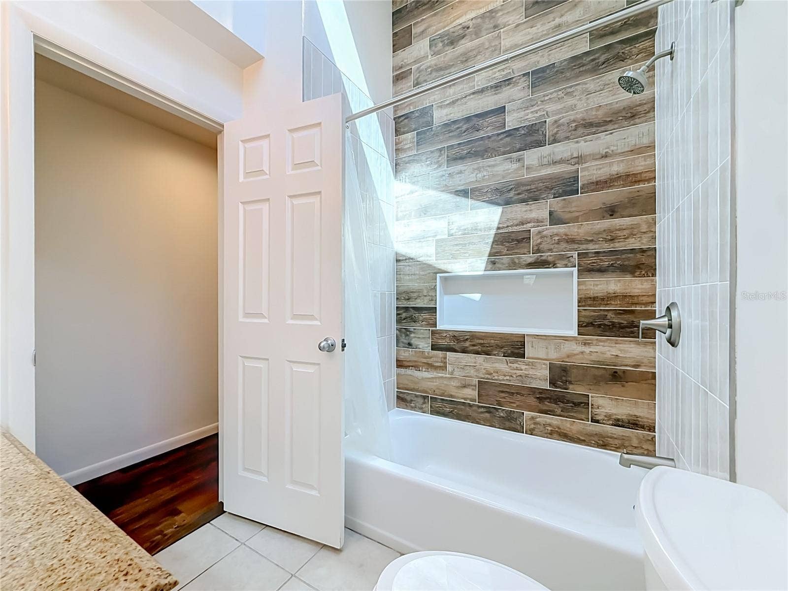 1852 SOURWOOD BOULEVARD, Dunedin, FL 34698 Hall Bath