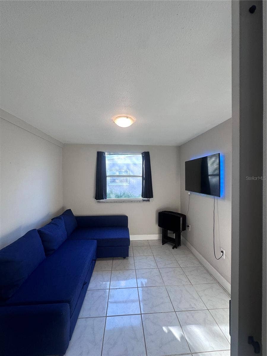 4762 54TH AVENUE N, St Petersburg, FL 33714 bonus room living room