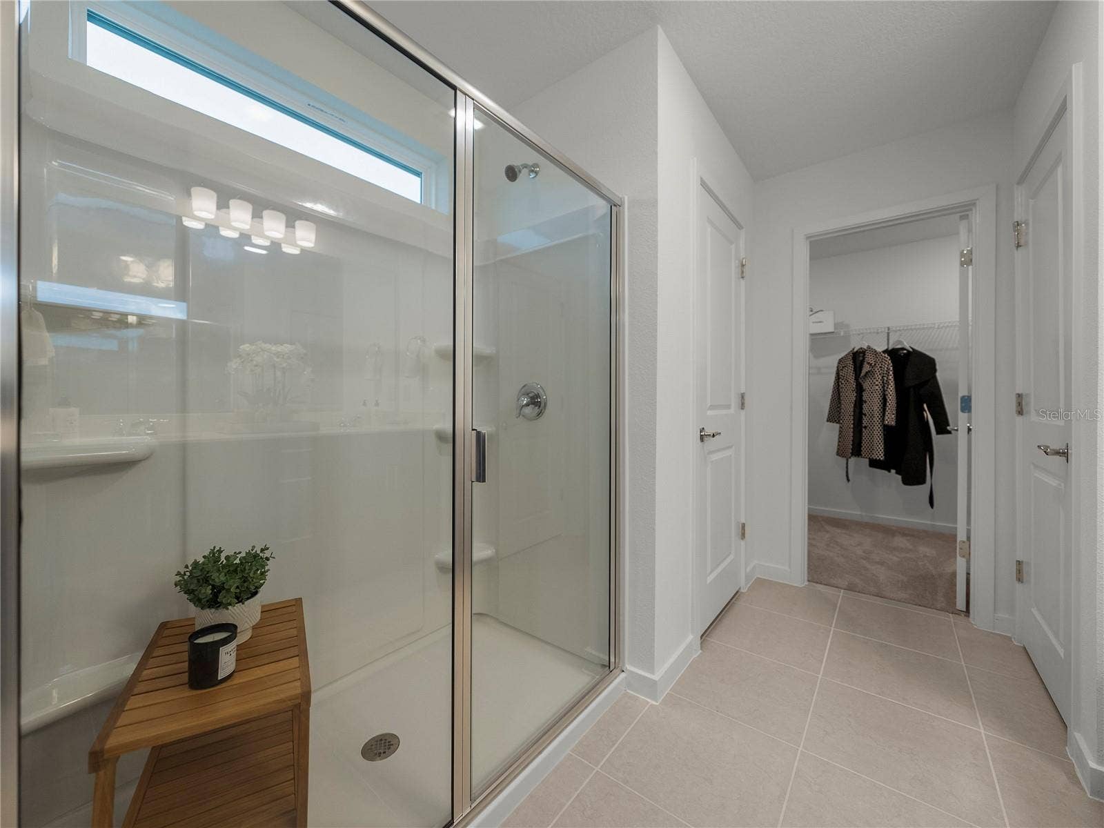 1076 KISTNA DRIVE, Zephyrhills, FL 33540 Primary Bath Walk in Shower, Walk in Linen Closet, Walk in Closet and Private Toilet Room