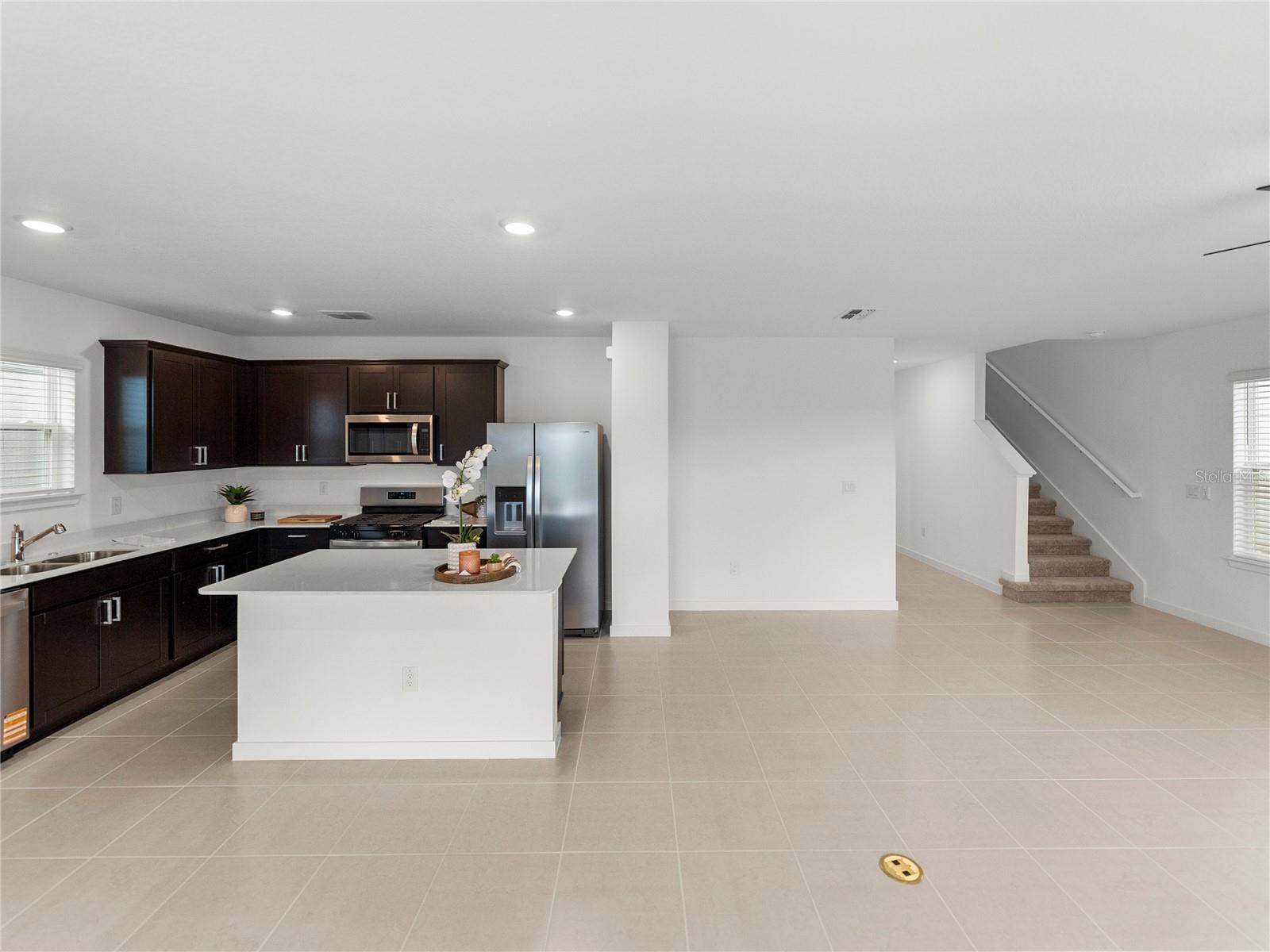 1076 KISTNA DRIVE, Zephyrhills, FL 33540 Open Main Living/Dining and Kitchen Area