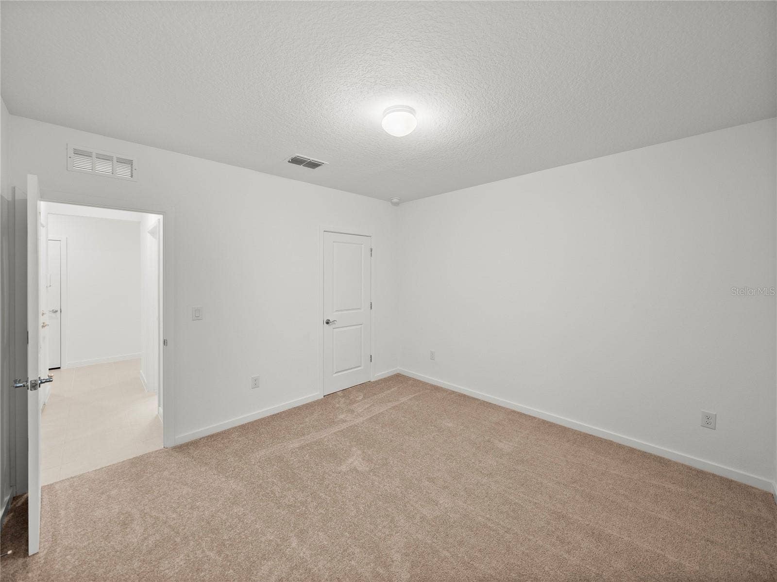 1076 KISTNA DRIVE, Zephyrhills, FL 33540 Alternate View Downstairs Bedroom w/Walk in Closet and Full Bathroom