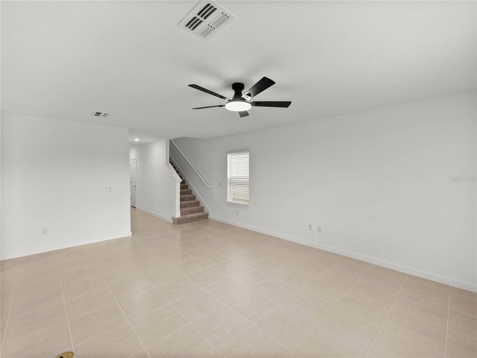 1076 KISTNA DRIVE, Zephyrhills, FL 33540 Large Living Area with built in Floor Outlet