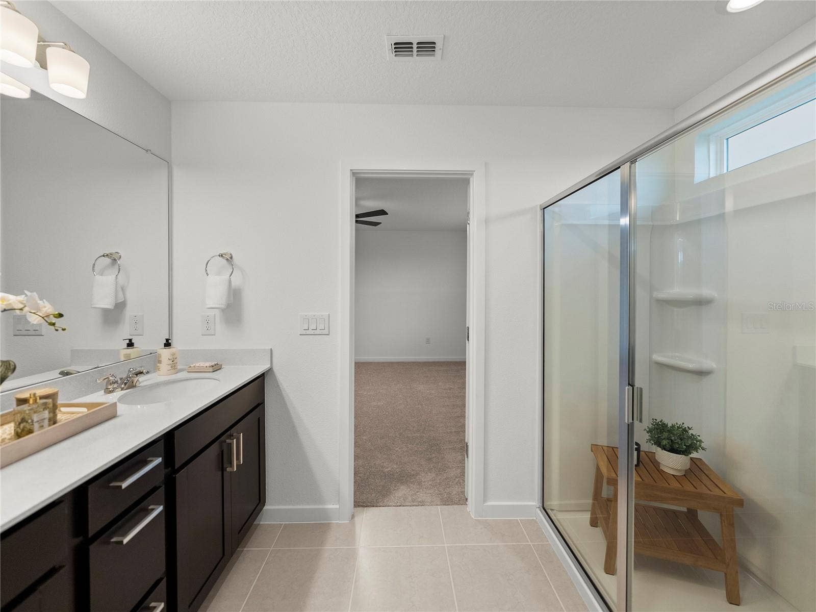 1076 KISTNA DRIVE, Zephyrhills, FL 33540 Primary Bath with New Hardware & Glass Shower Enclosure