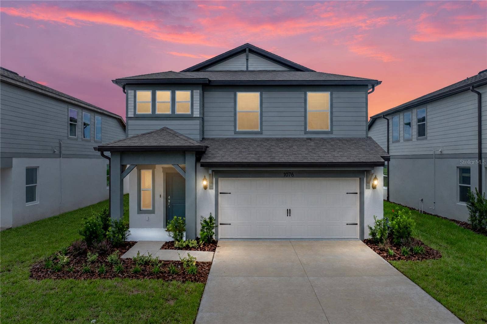 1076 KISTNA DRIVE, Zephyrhills, FL 33540 Exterior Front Night Shot
