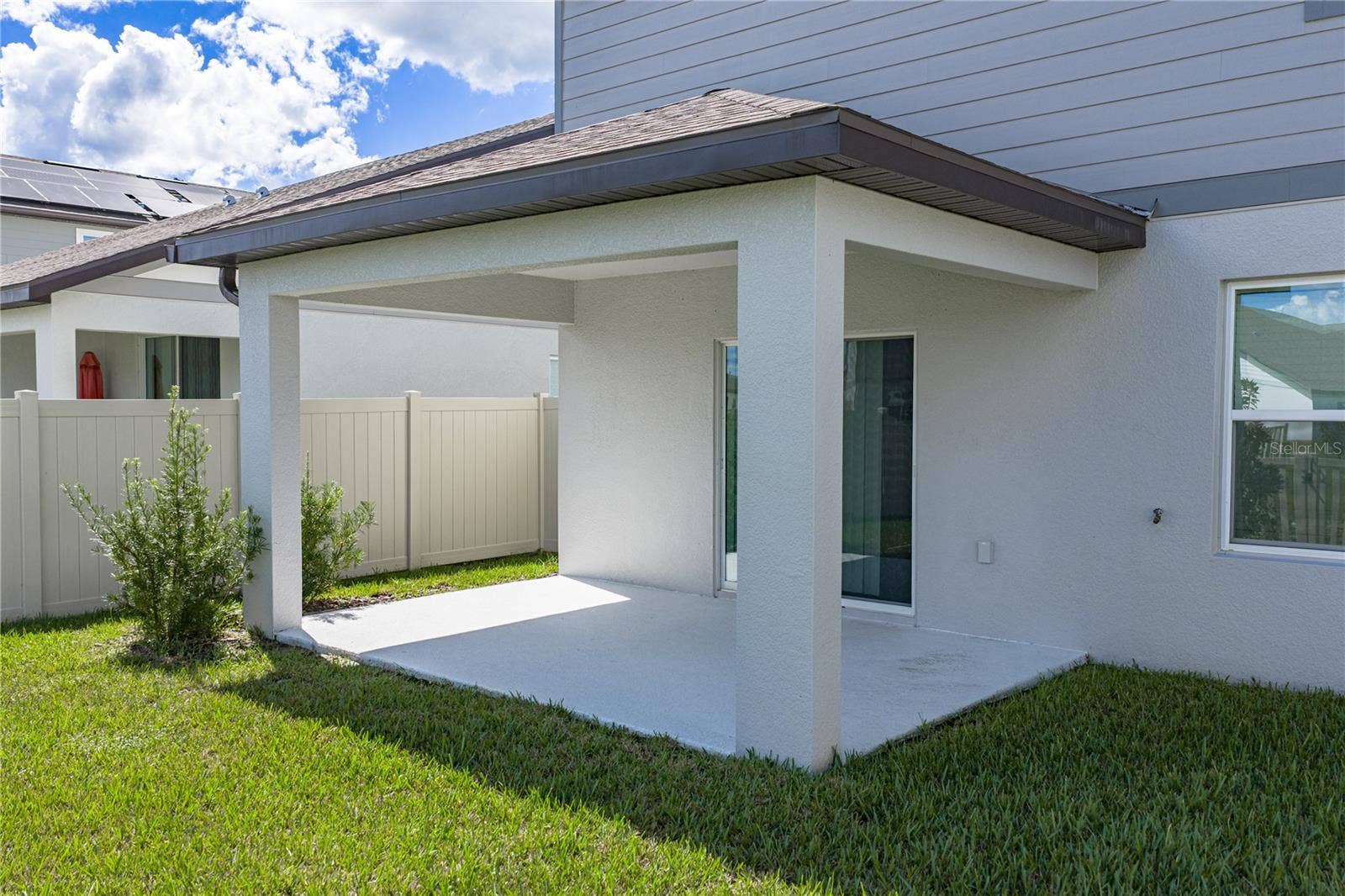 1076 KISTNA DRIVE, Zephyrhills, FL 33540 Rear Covered Lanai