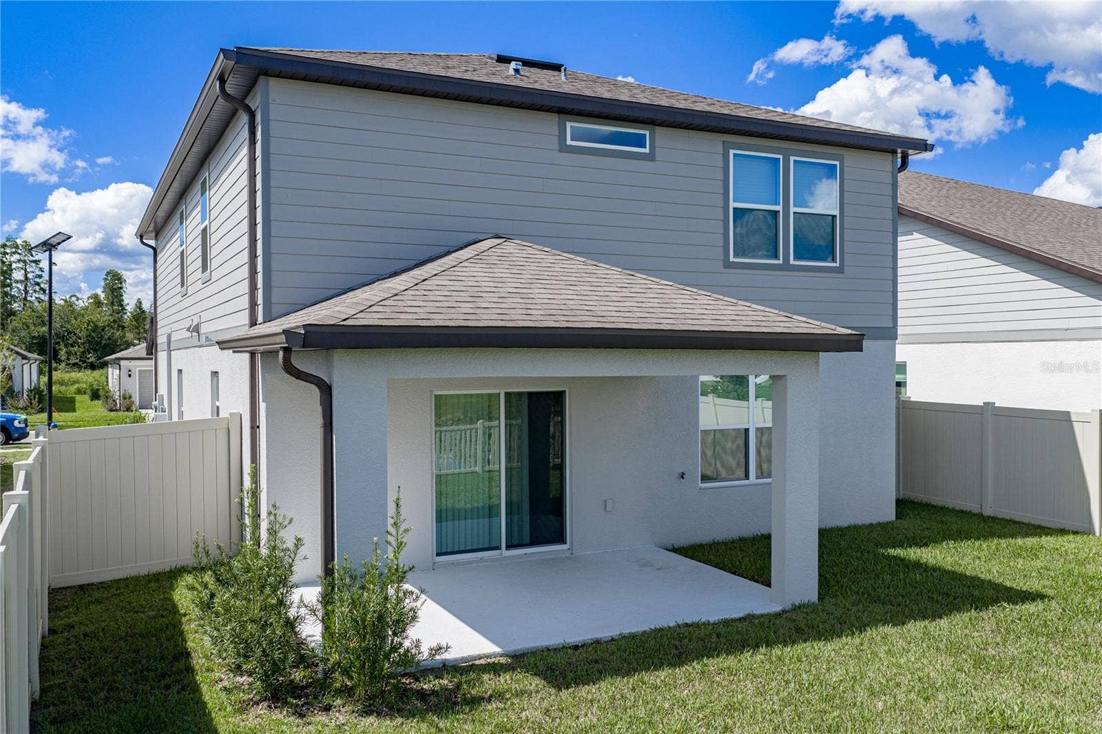 1076 KISTNA DRIVE, Zephyrhills, FL 33540 Large Outdoor Covered Lanai