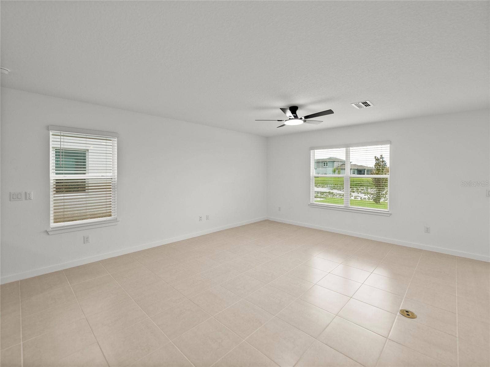 1076 KISTNA DRIVE, Zephyrhills, FL 33540 Large Living Area with Convenient Floor Electrical Outlet
