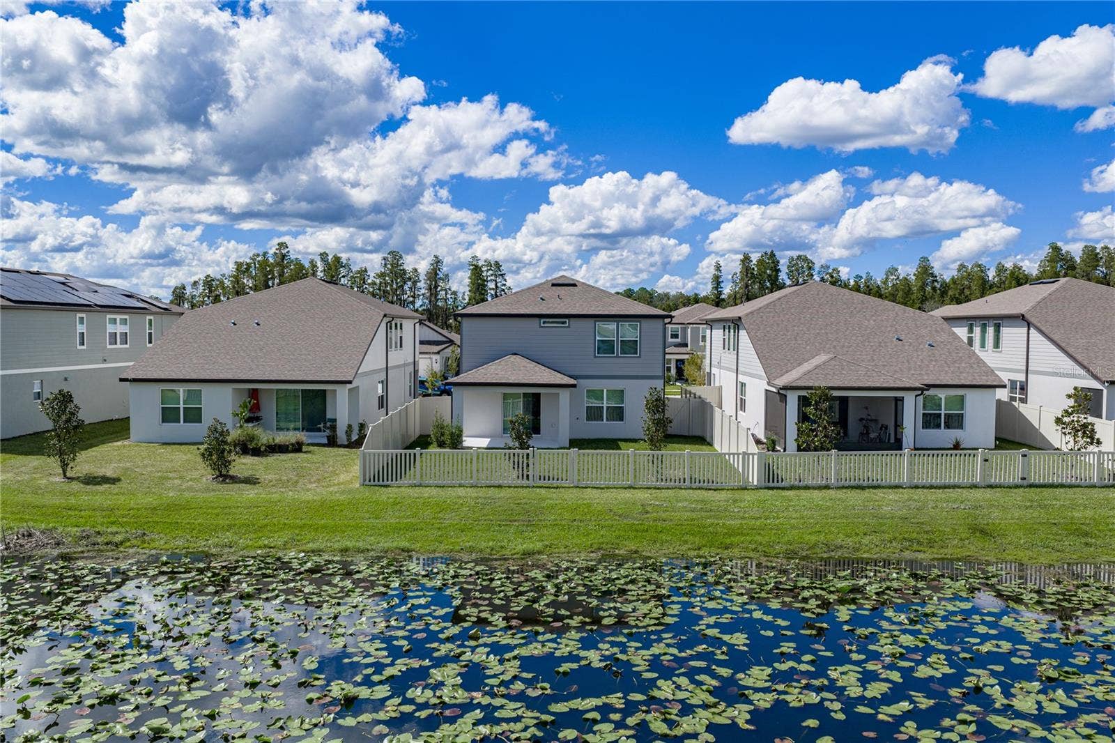 1076 KISTNA DRIVE, Zephyrhills, FL 33540 Rear Pond Homesite