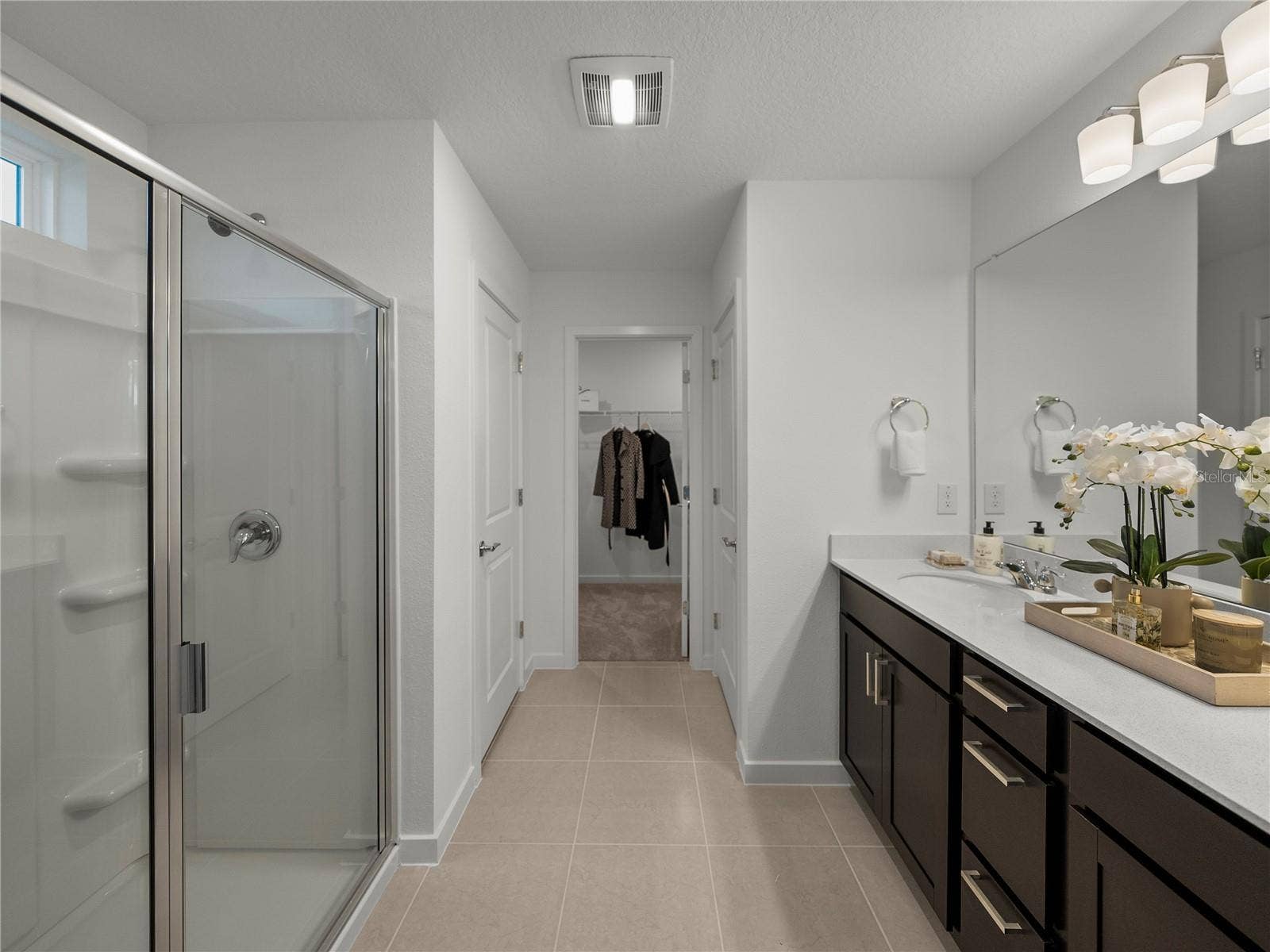 1076 KISTNA DRIVE, Zephyrhills, FL 33540 Primary Suite Bath with Dual Sinks, Large Enclosed Walk in Shower