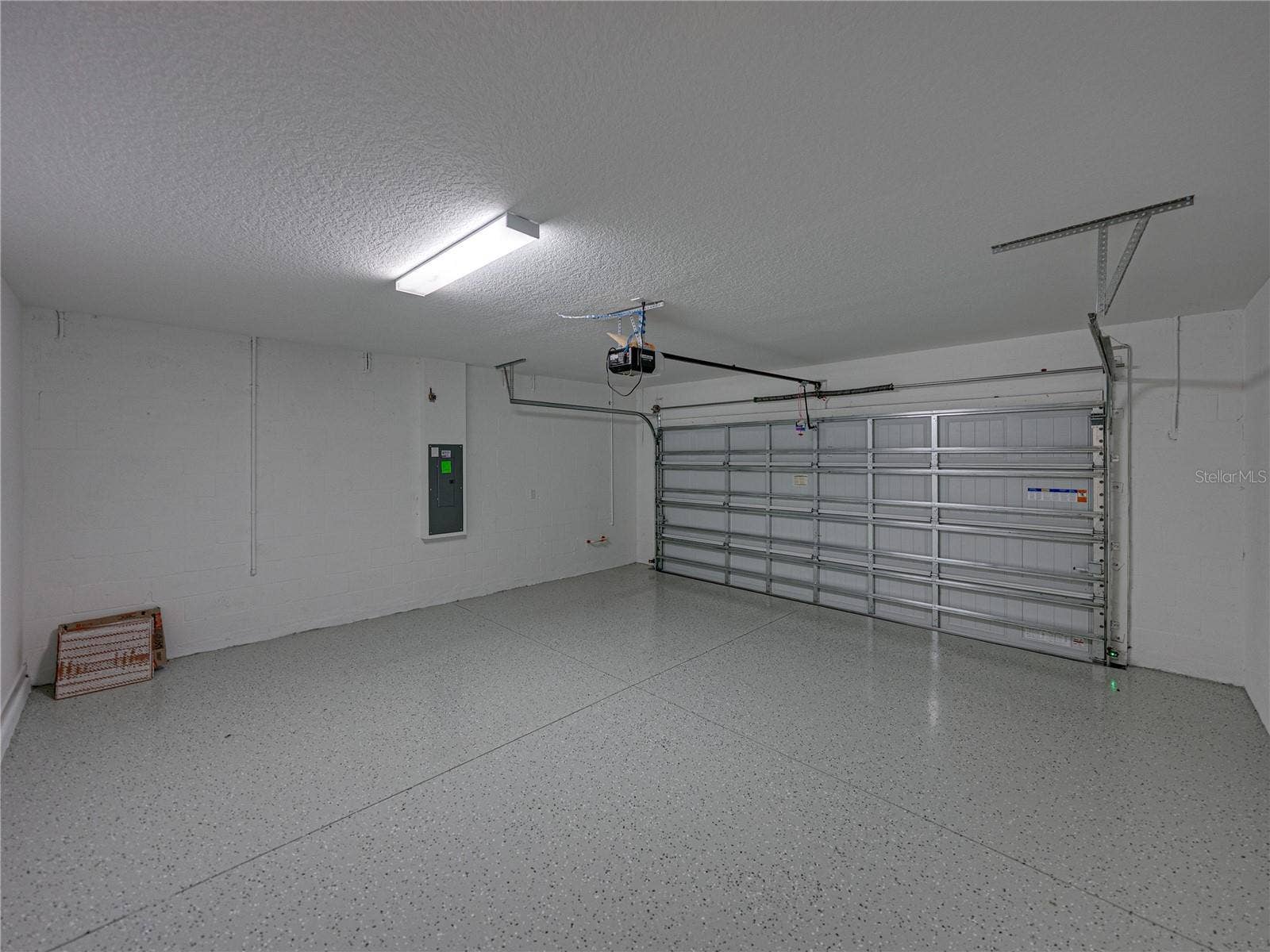 1076 KISTNA DRIVE, Zephyrhills, FL 33540 Brand New Epoxy Oversized Garage