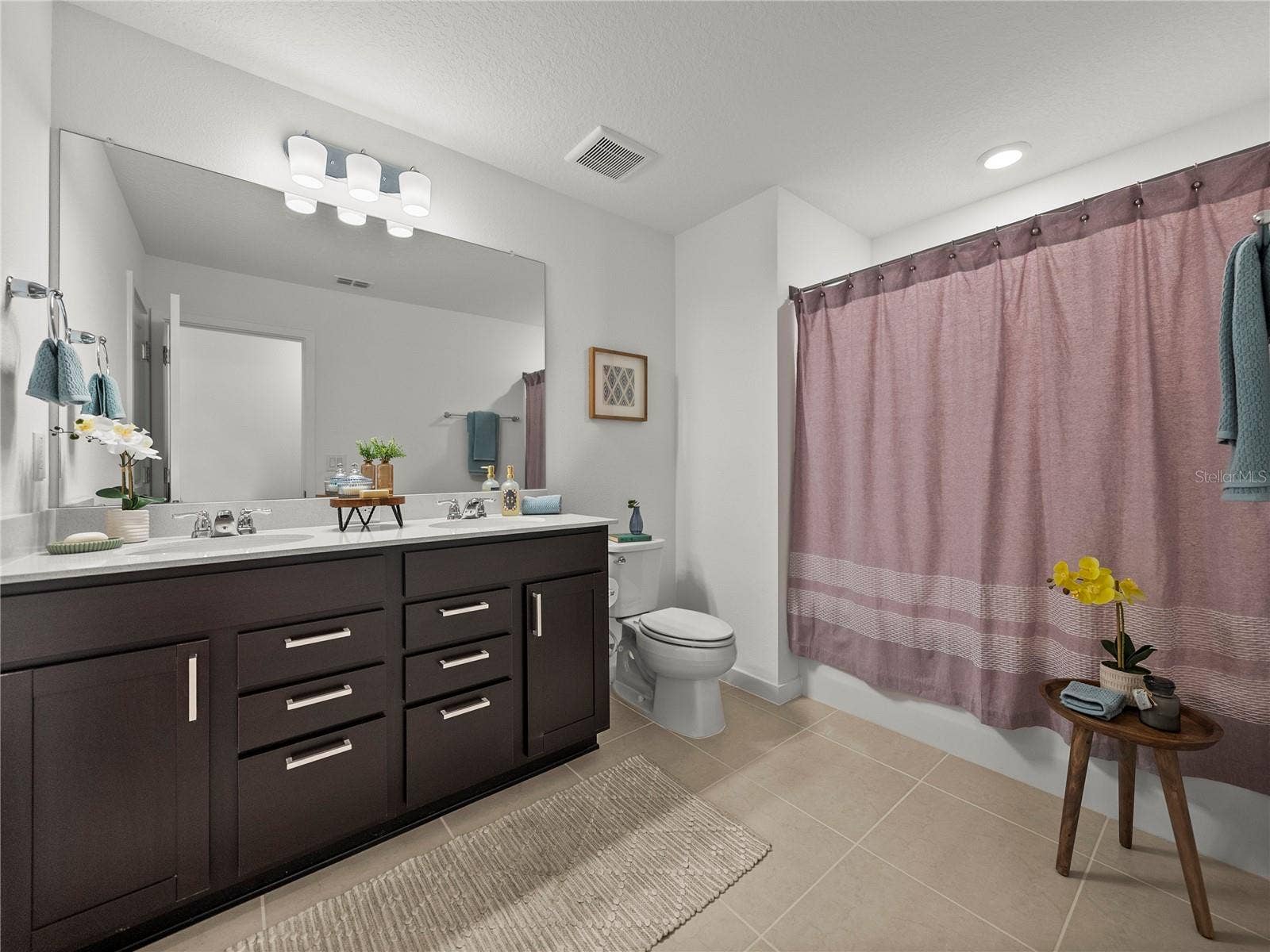 1076 KISTNA DRIVE, Zephyrhills, FL 33540 Upstairs Spacious Full 3rd Bath with Dual Sinks, Extra Long Vanity w/Dual Drawer Banks and Built in Linen Closet