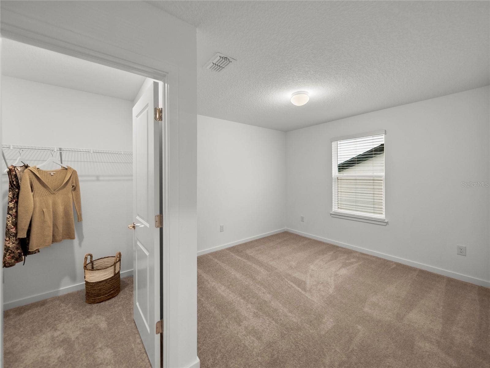 1076 KISTNA DRIVE, Zephyrhills, FL 33540 Rear Bedroom with Large Walk in Closet