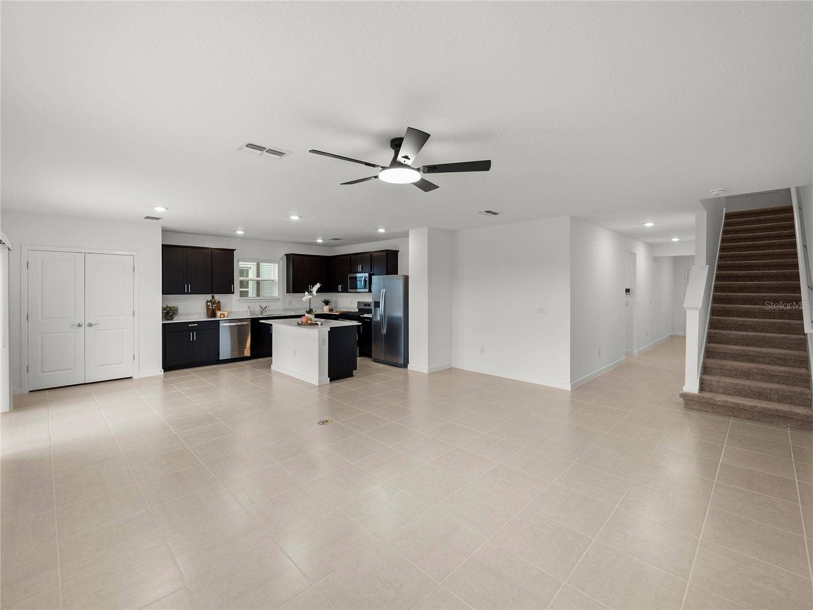 1076 KISTNA DRIVE, Zephyrhills, FL 33540 Open Main Living/Dining and Kitchen Area