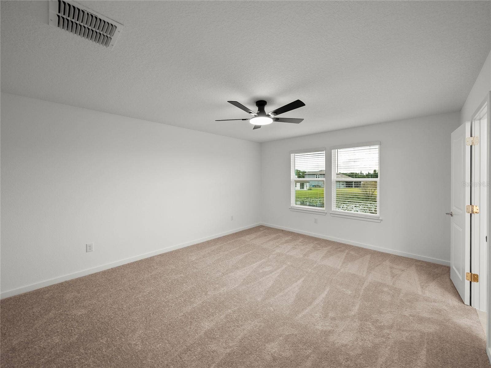 1076 KISTNA DRIVE, Zephyrhills, FL 33540 Alternate View of Primary Suite