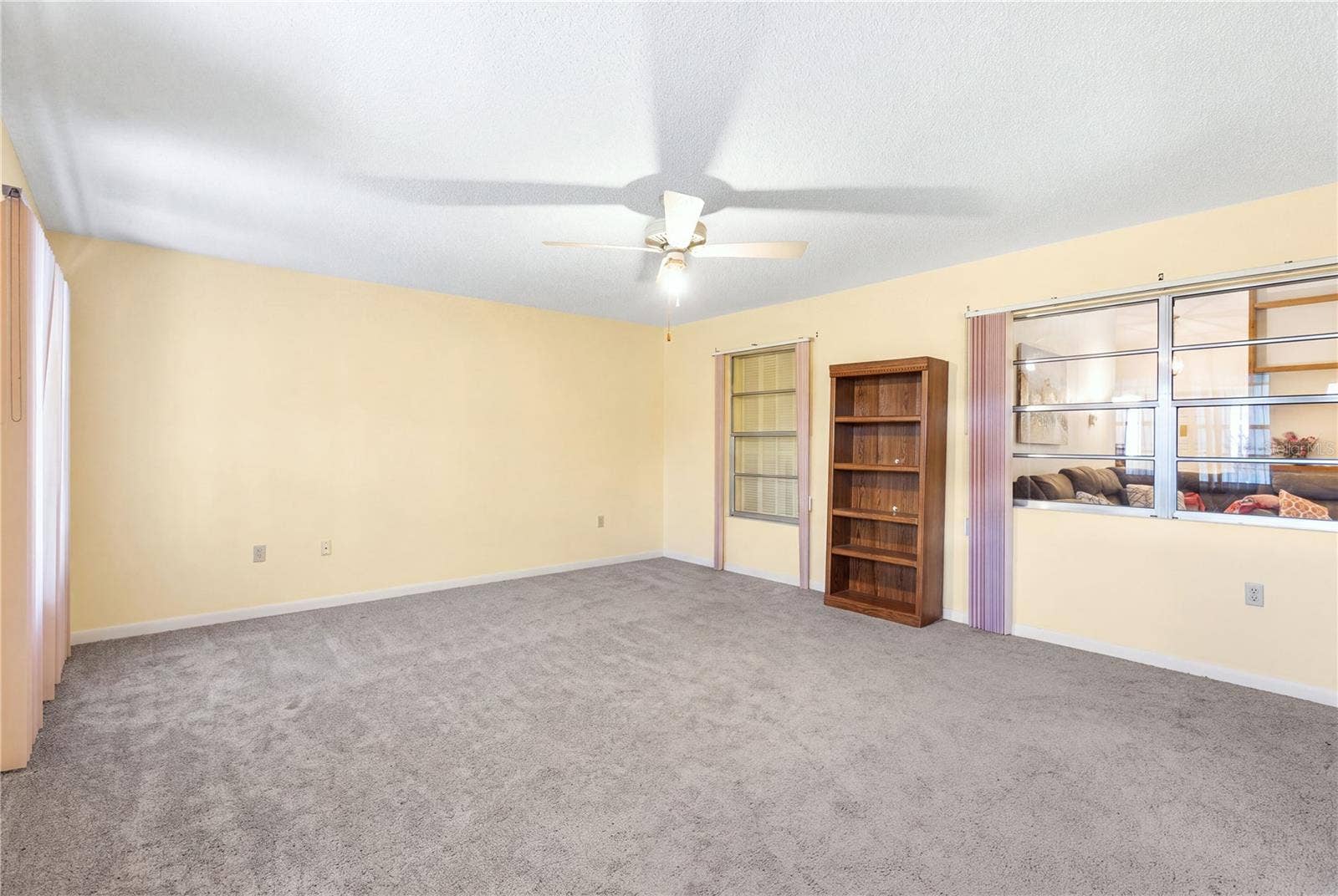 7418 RIVERBANK DRIVE, New Port Richey, FL 34655 bonus space located in the rear of the home