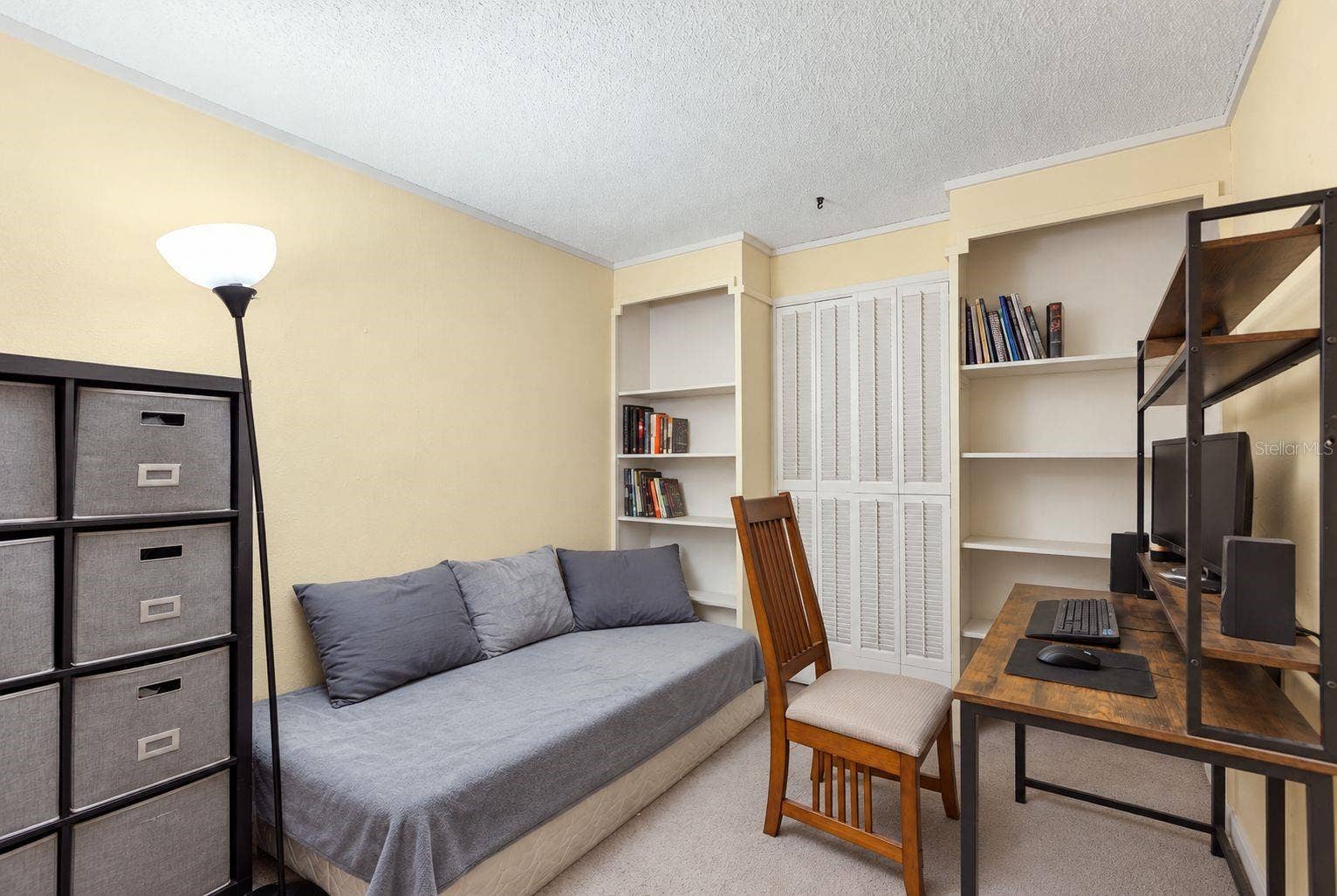 7418 RIVERBANK DRIVE, New Port Richey, FL 34655 Bedroom 2 (AI generated to declutter items in room)