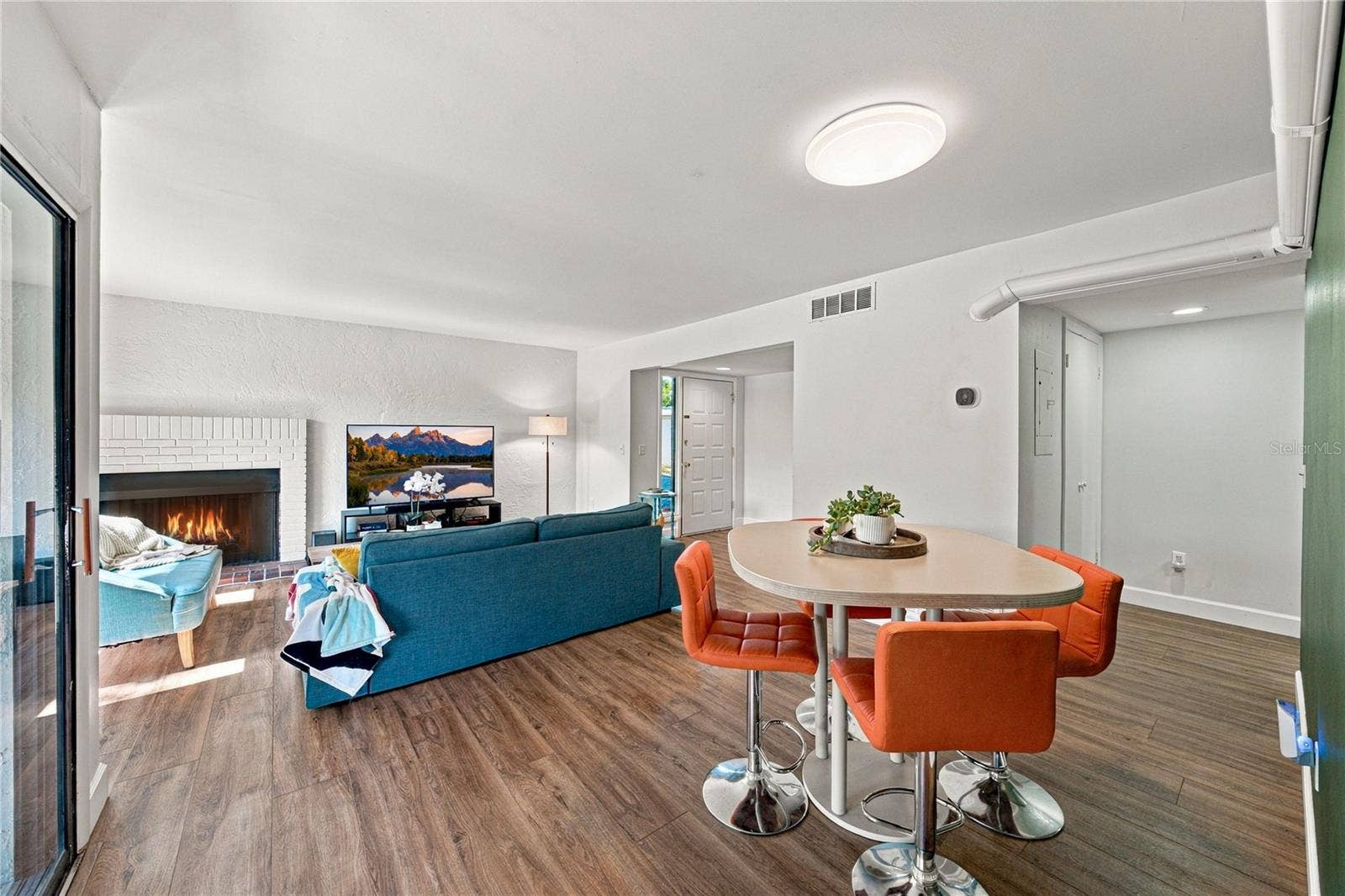 Light and Bright Luxury Vinyl Plank Flooring throughout Great Room