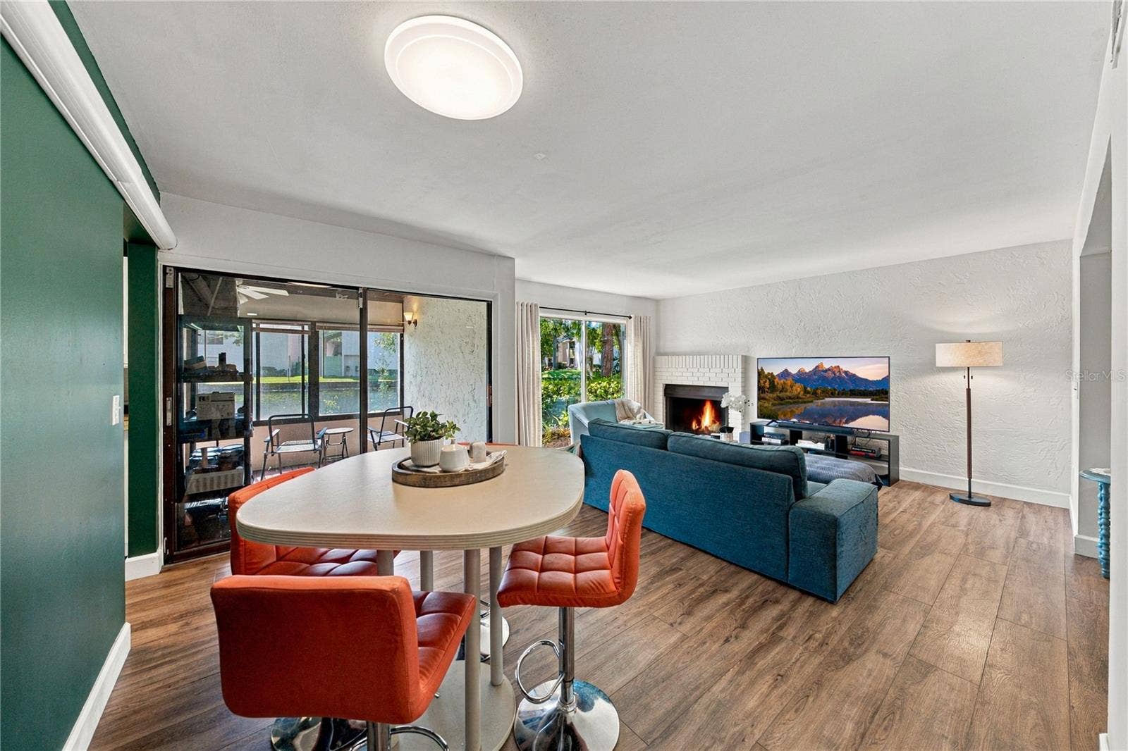 Light and Bright Luxury Vinyl Plank Flooring throughout Great Room