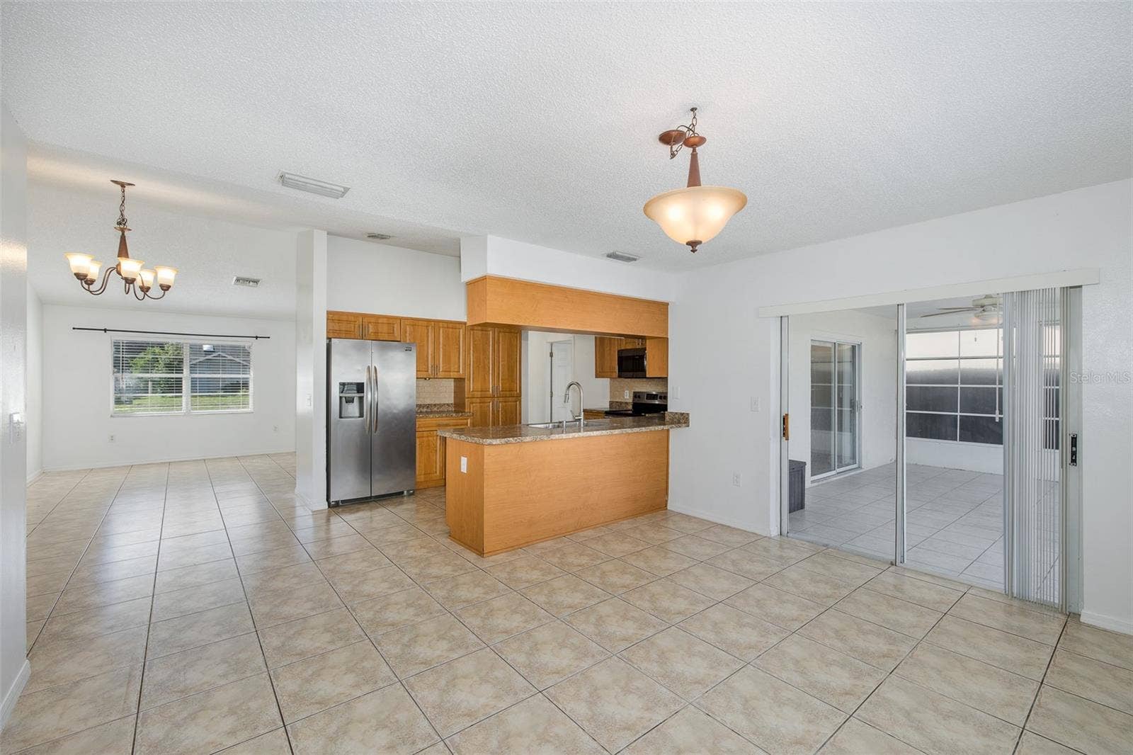 Family room overlooking the kitchen and dining