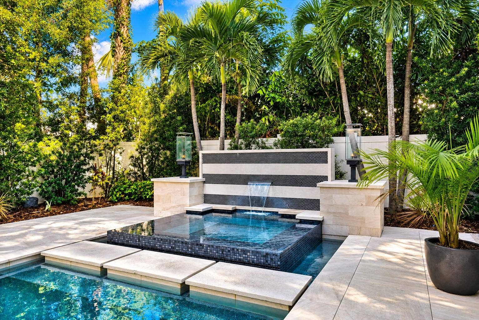 Spa w/waterfall and natural gas sconces