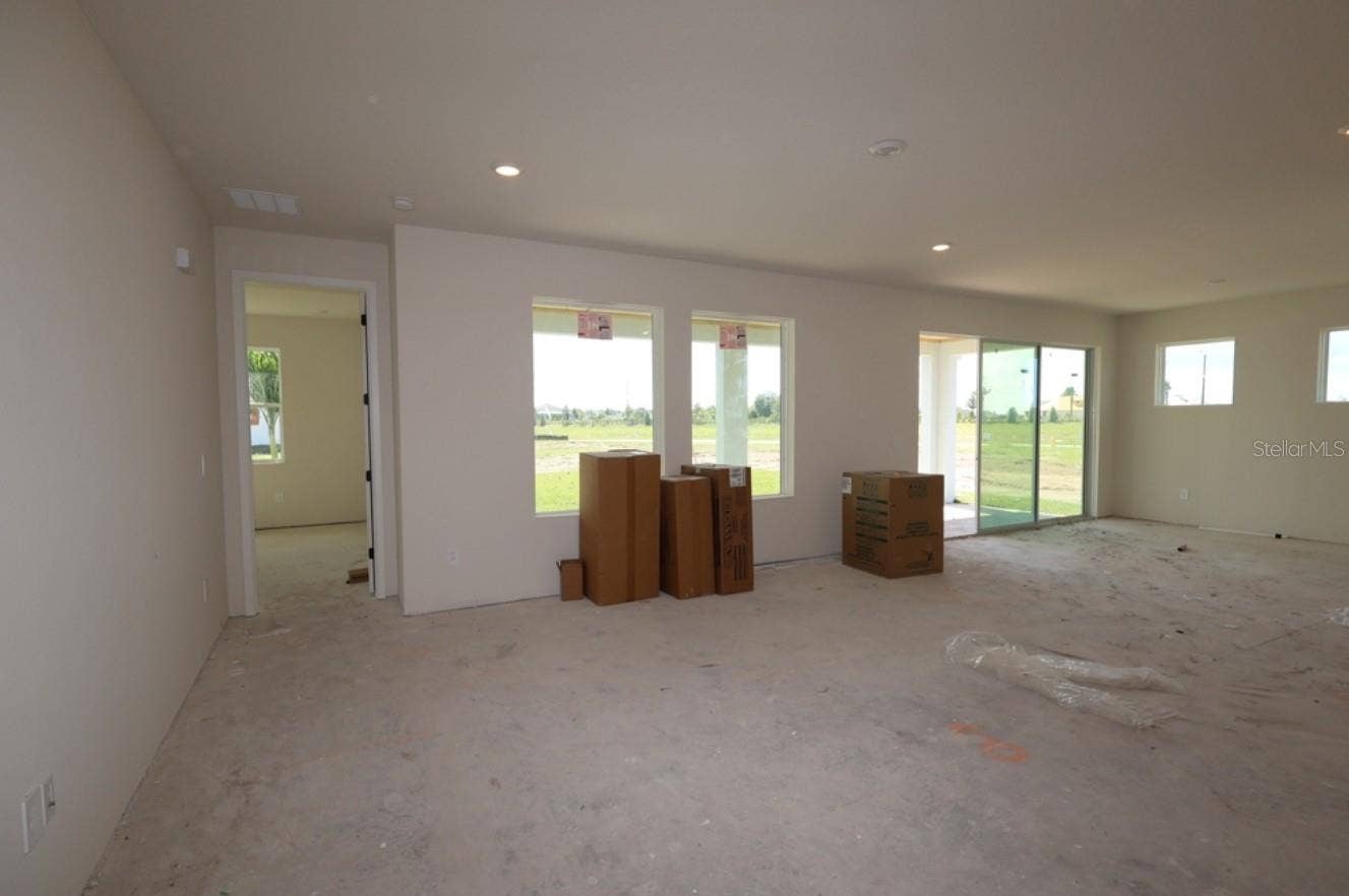 12835 SALTY DOG CROSSING, Palmetto, FL 34221 Family Room **Under Construction