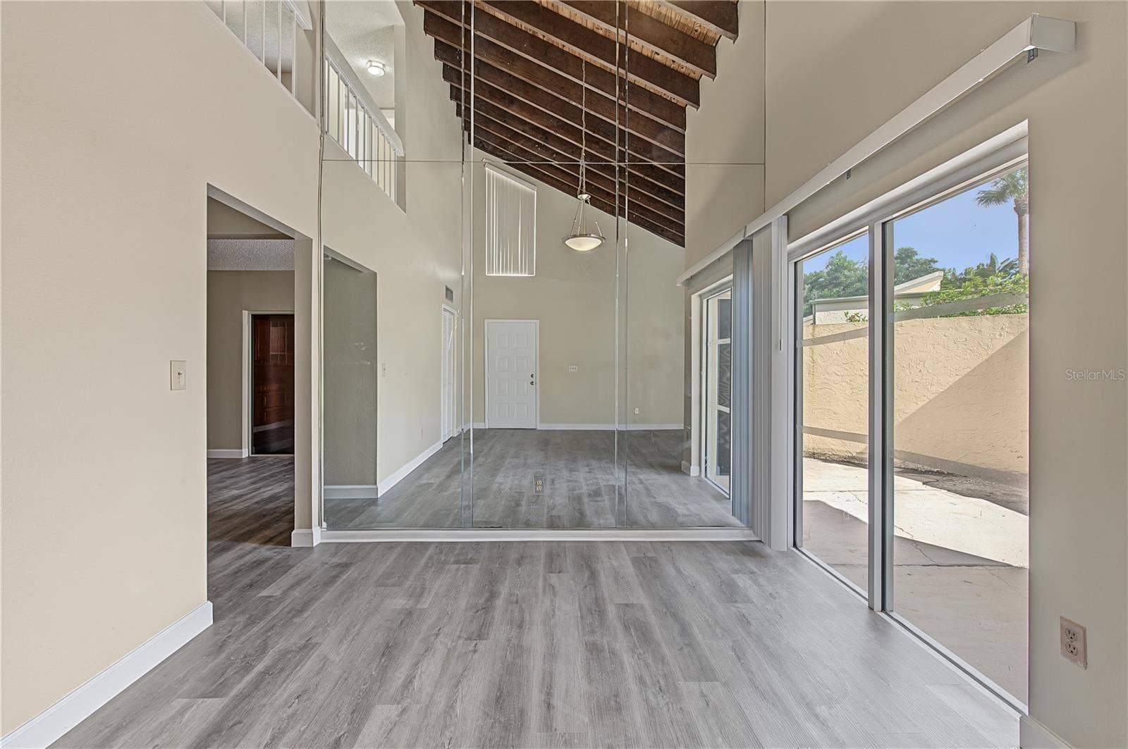 2729 FOXFIRE COURT, #C, Clearwater, FL 33761 Dining Room, Private walled outside patio to the right, lots of sunlight.