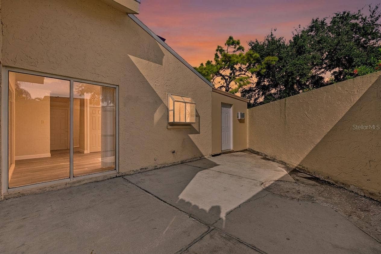 2729 FOXFIRE COURT, #C, Clearwater, FL 33761 Outdoor private patio just off of the Family Room