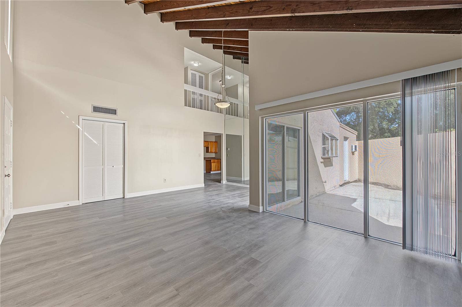 2729 FOXFIRE COURT, #C, Clearwater, FL 33761 Spacious Family and Dining Room, Vaulted Ceilings and lots of sunlight.
