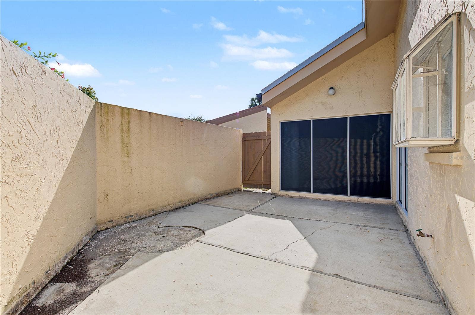 2729 FOXFIRE COURT, #C, Clearwater, FL 33761 Outdoor private patio just off of the Family Room