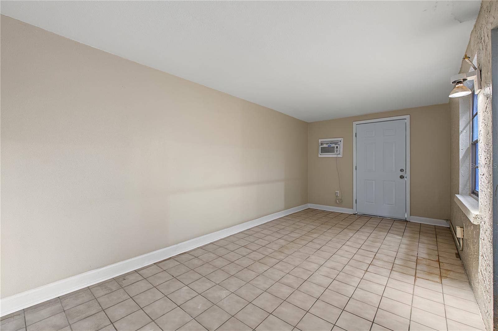 2729 FOXFIRE COURT, #C, Clearwater, FL 33761 Side patio off of the kitchen
